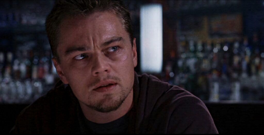 Intense Leonardo DiCaprio Wallpaper from The Departed - Blurred Bar Scene