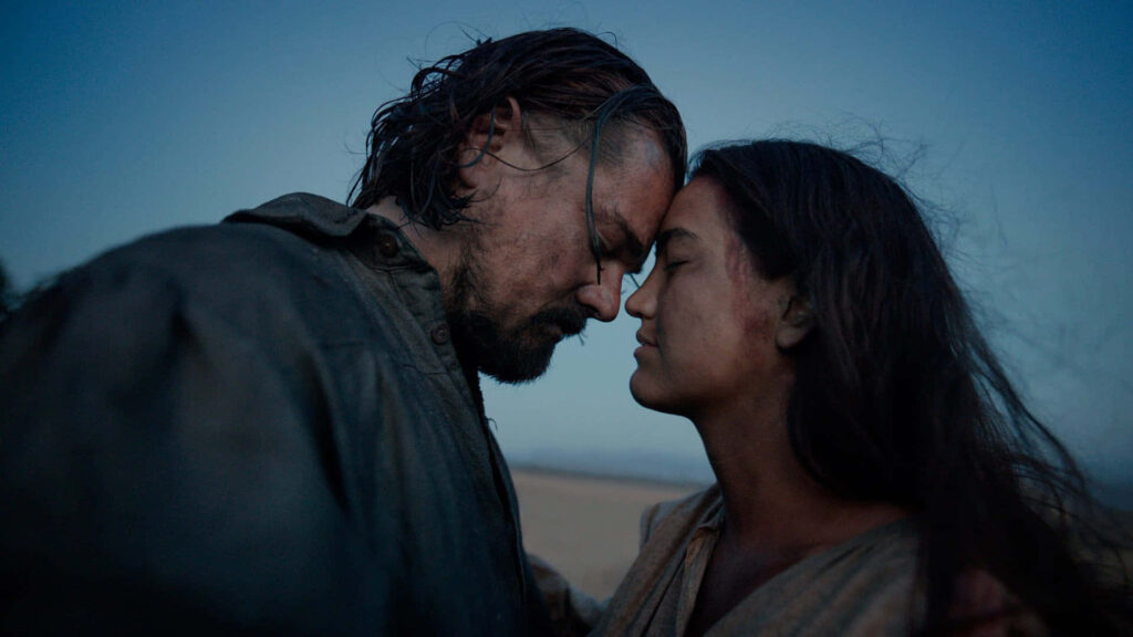 Leonardo DiCaprio The Revenant intense emotional scene forehead touch serene sky wallpaper