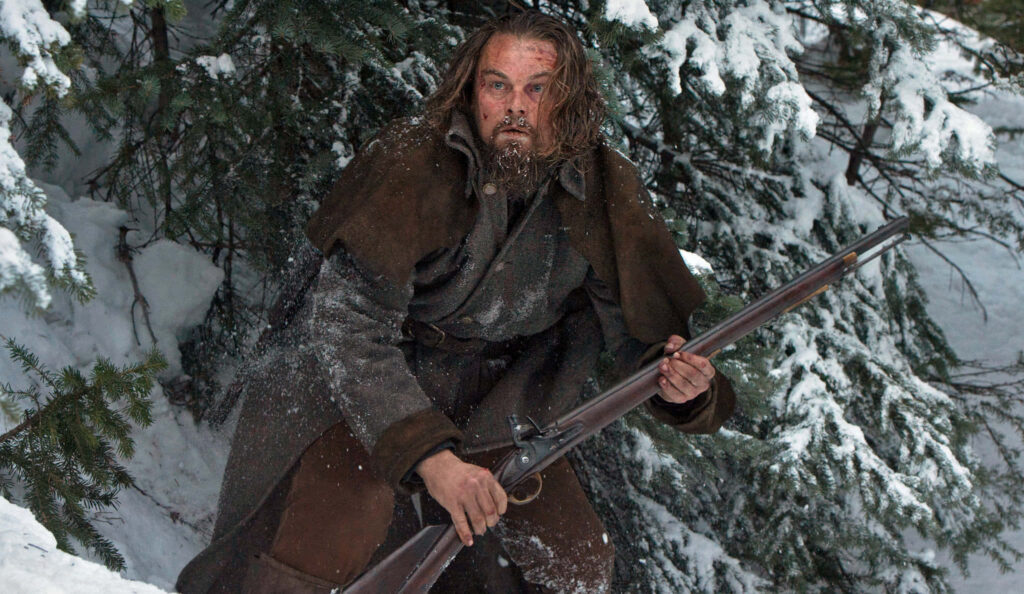 Leonardo DiCaprio as Hugh Glass in The Revenant intense snowy wilderness wallpaper background