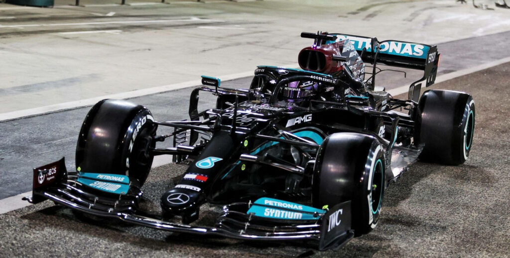 Front view of Lewis Hamilton Mercedes F1 car showcasing sleek design and powerful engineering Wallpaper