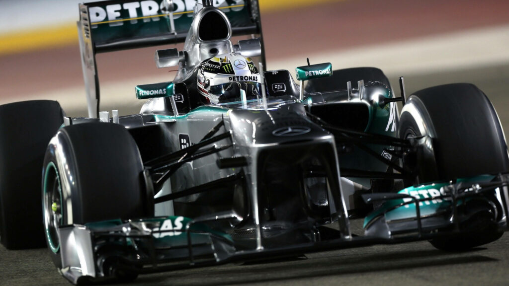 Lewis Hamilton Mercedes Formula 1 racing car front view high speed dynamic wallpaper background
