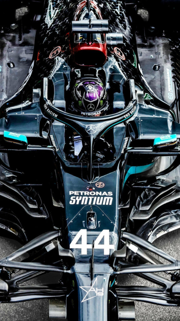 Lewis Hamilton in Mercedes F1 car ready to race high definition iPhone racing wallpaper background