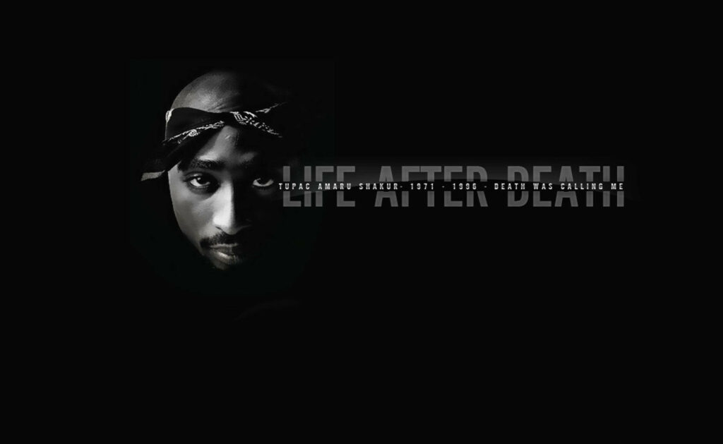 Eternal Soul: Tupac's Gaze Through Life After Death Wallpaper