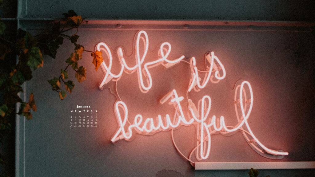 Neon life is beautiful sign pink glow green leaves January 2022 calendar minimalist wallpaper background