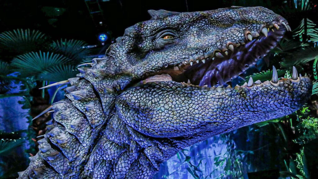 Lifelike T-Rex Wallpaper: Dark, Atmospheric Jungle Scene