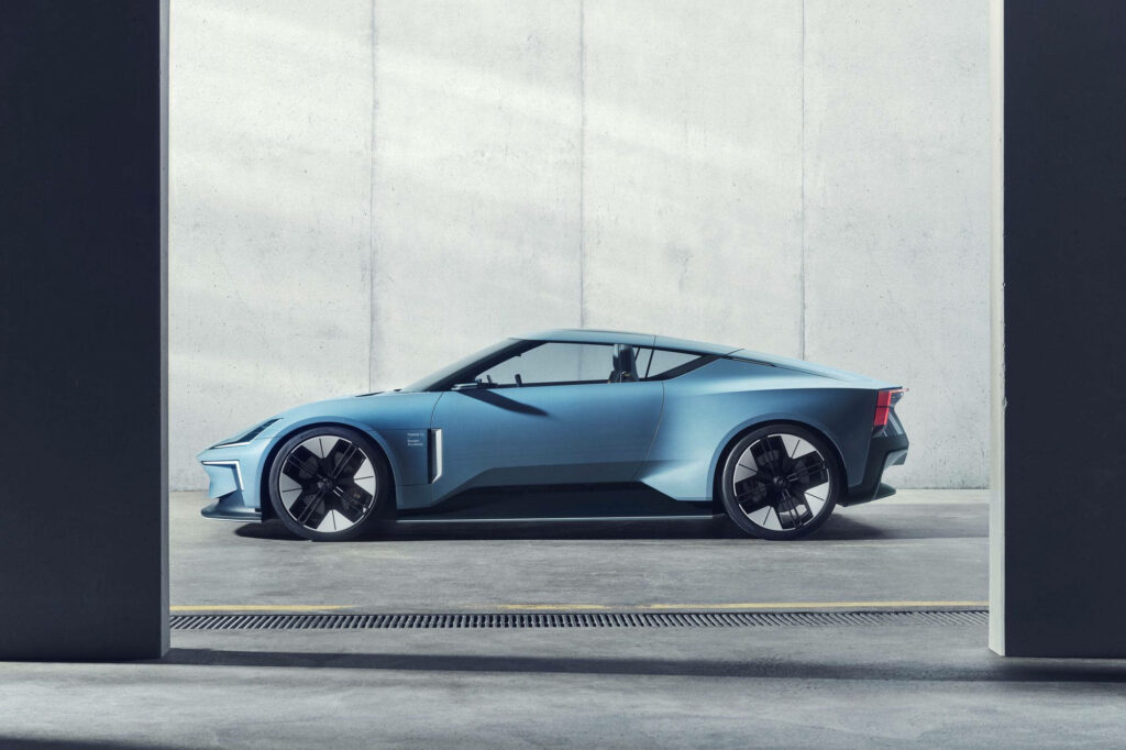 Light blue Polestar 1 electric car showcasing sleek design and precision engineering on concrete Wallpaper