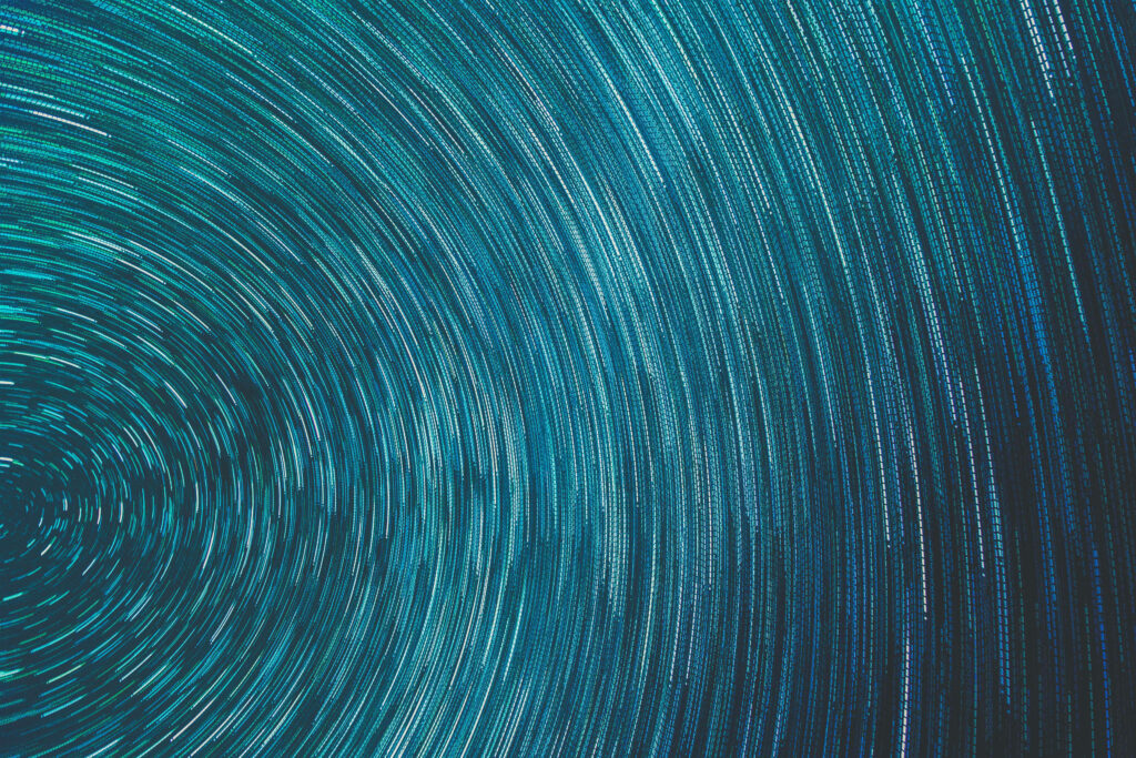 Mesmerizing Light Blue and Teal Abstract Swirling Background Wallpaper