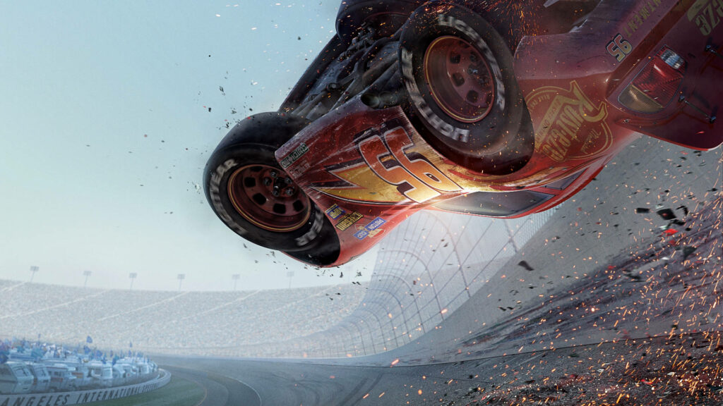 Lightning McQueen crash slow motion sparks racetrack Cars 3 intense action stadium wallpaper