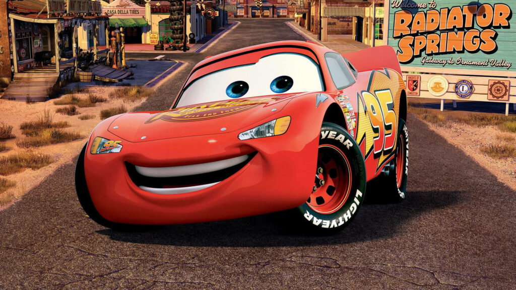 Lightning McQueen in vibrant Radiator Springs desert wallpaper from Cars Pixar movie background