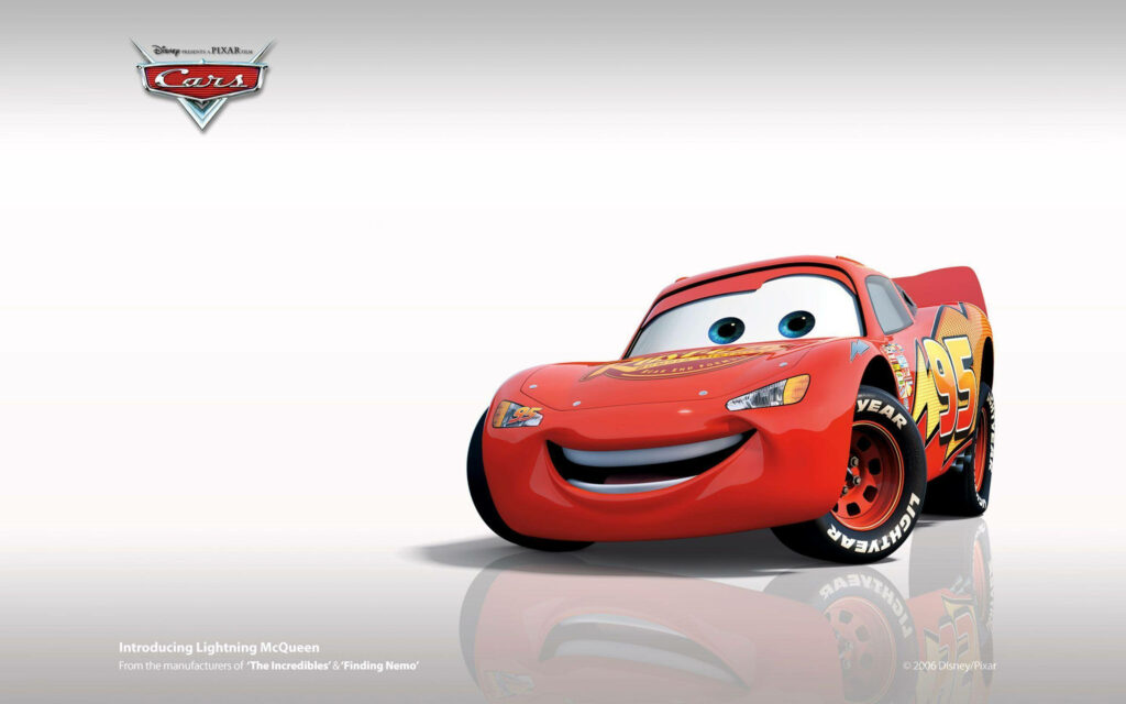 Lightning McQueen vibrant red race car wallpaper with bold decals and dynamic animated pose