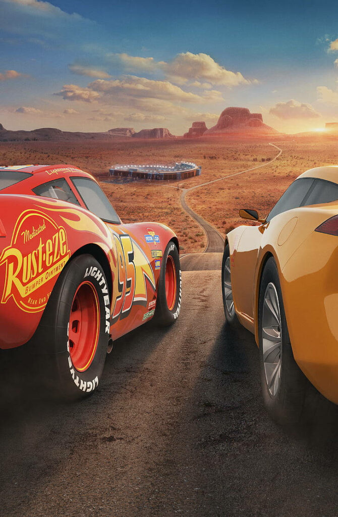 Lightning McQueen and Cruz Ramirez on desert road sunset vibrant racing decals CGI animation Wallpaper