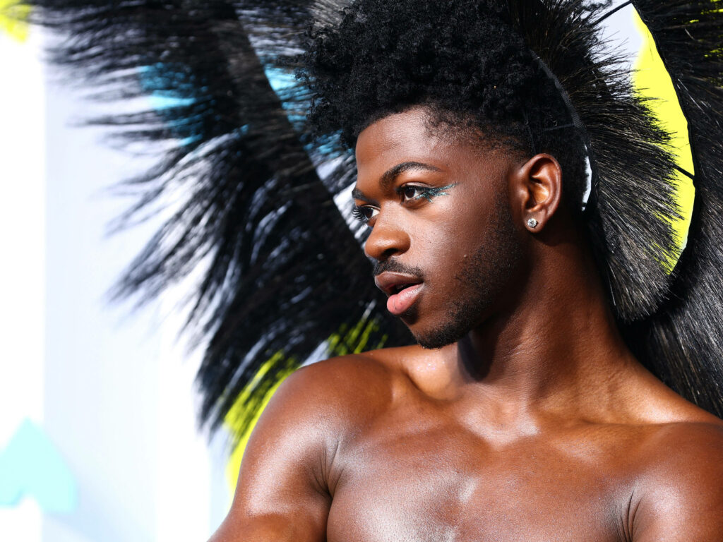 Lil Nas X Wallpaper: Bold Style & Confident Expression Background