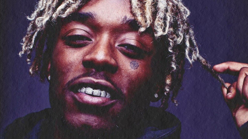 Rolling in Luxury: Lil Uzi Vert Showcases His Stylish Persona Alongside his Lavish Rolls Royce Wallpaper