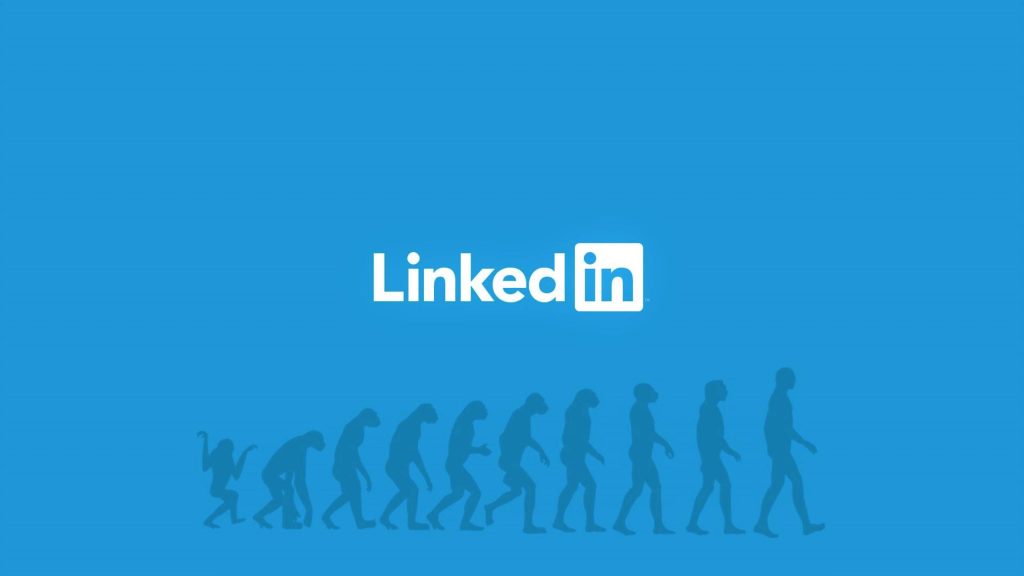 LinkedIn logo on blue background with March of Progress evolution silhouettes for career growth Wallpaper