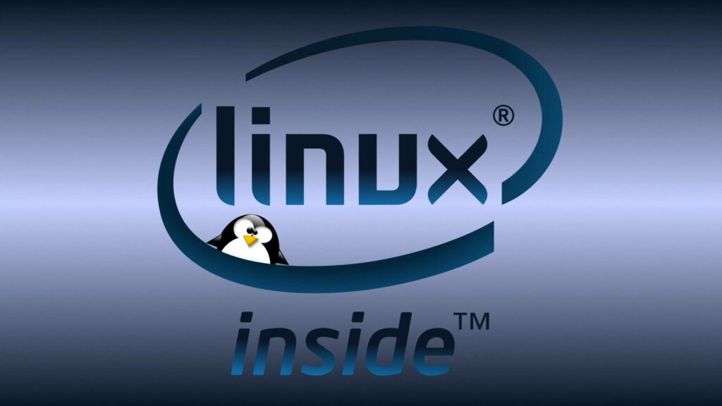 Embracing the Linux Spirit: Tux the Penguin Reigns in the Linux Inside Wallpaper