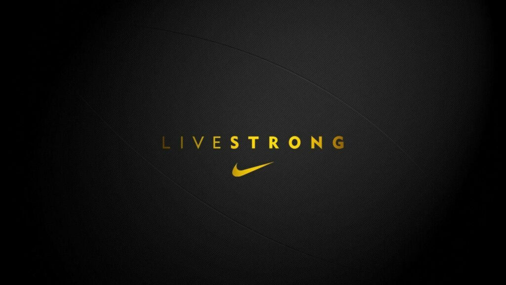 Empowering Athletes with Nike: Vibrant Live Strong Wallpaper with Iconic Gold Text and Logo