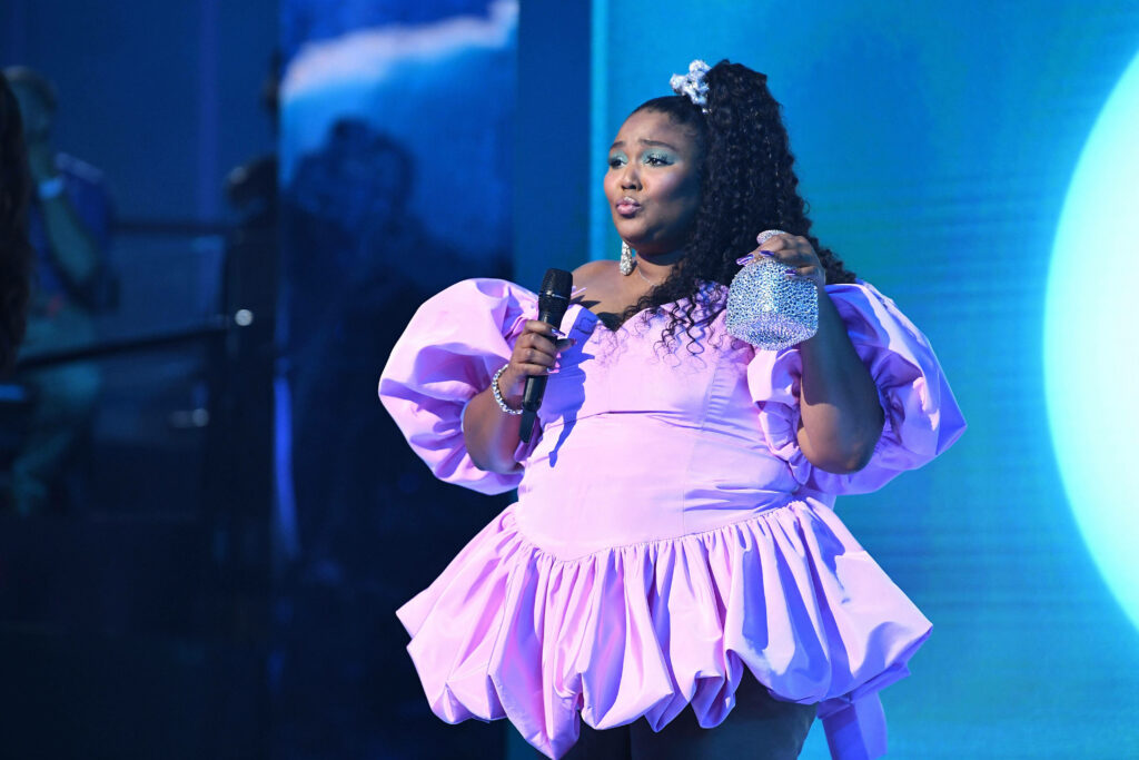 Lizzo in Stunning Marc Jacobs Dress: Confident Elegance Wallpaper