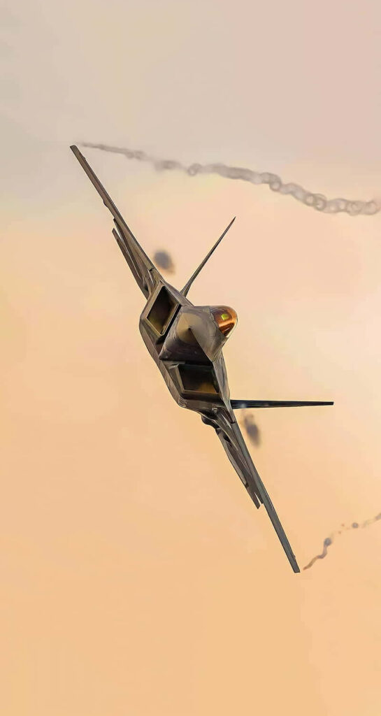 Lockheed Martin F-22 Raptor stealth fighter jet flying in golden sky with glowing afterburners Wallpaper
