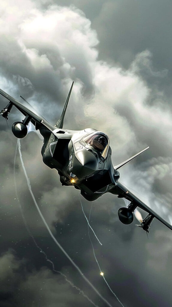 Lockheed Martin F-35 stealth fighter jet flying through dramatic stormy skies with detailed textures Wallpaper