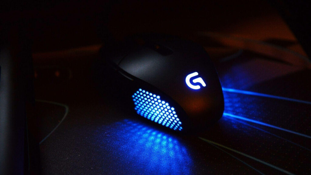 Logitech gaming mouse with vibrant blue LED lighting modern design on wallpaper background