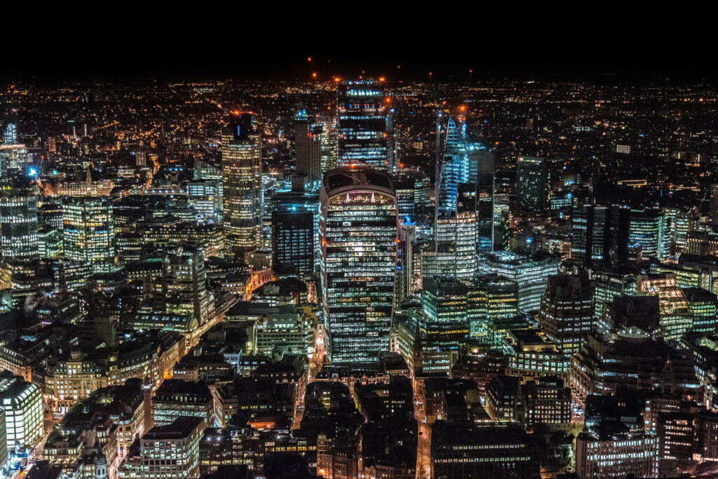 City Lights: London's Skyline at Night from Above Wallpaper