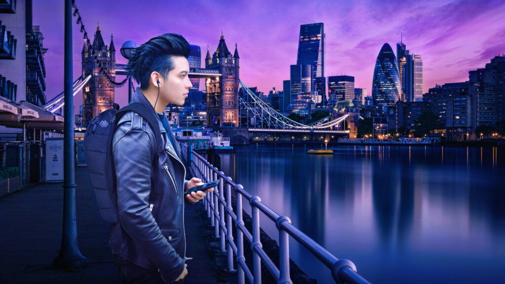 London's Majestic Blue Hour Cityscape: Tower Bridge, Skyscrapers and a Boy Admiring the Riverside View Wallpaper