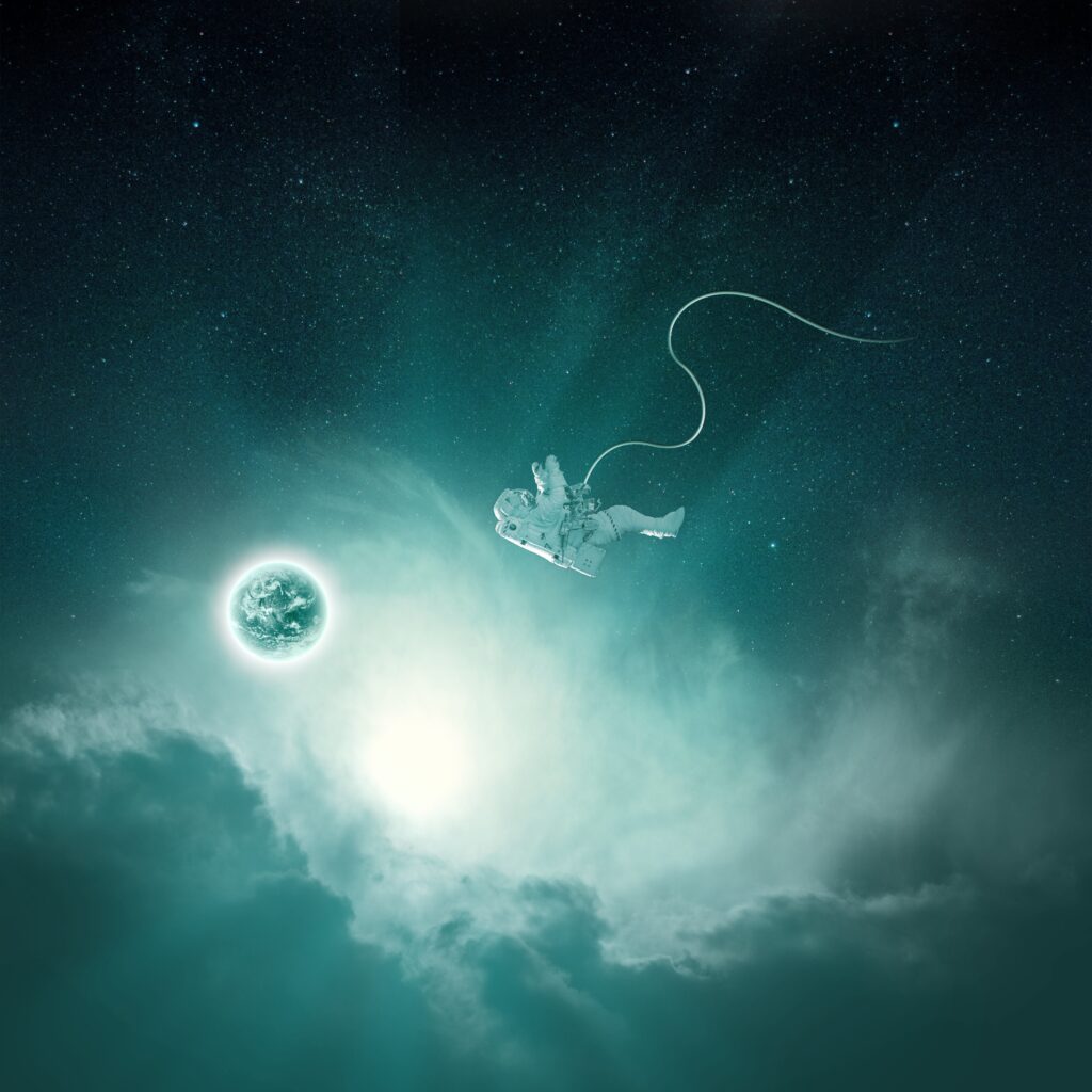 Lone Astronaut in Cosmic Space: Ethereal Wallpaper Background