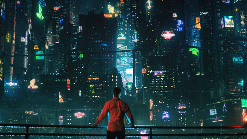 Futuristic Night Cityscape: Lone Figure Amidst Neon Skyscrapers Wallpaper