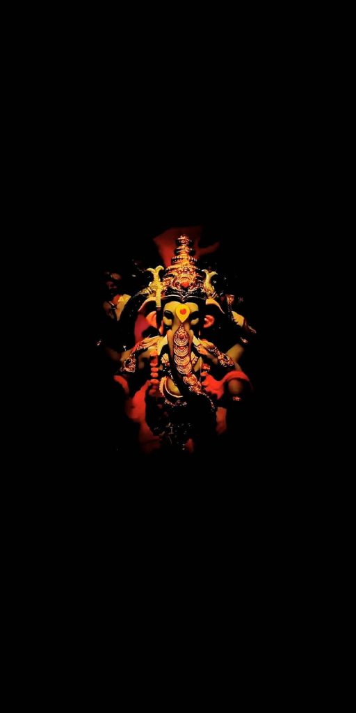 Lord Ganesha iPhone wallpaper vibrant red robes gold accents low-key lighting black background