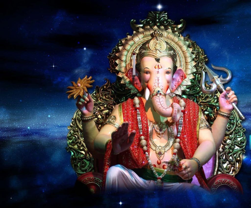 Lord Ganesha in red robes with trident and lotus cosmic starry sky devotional wallpaper