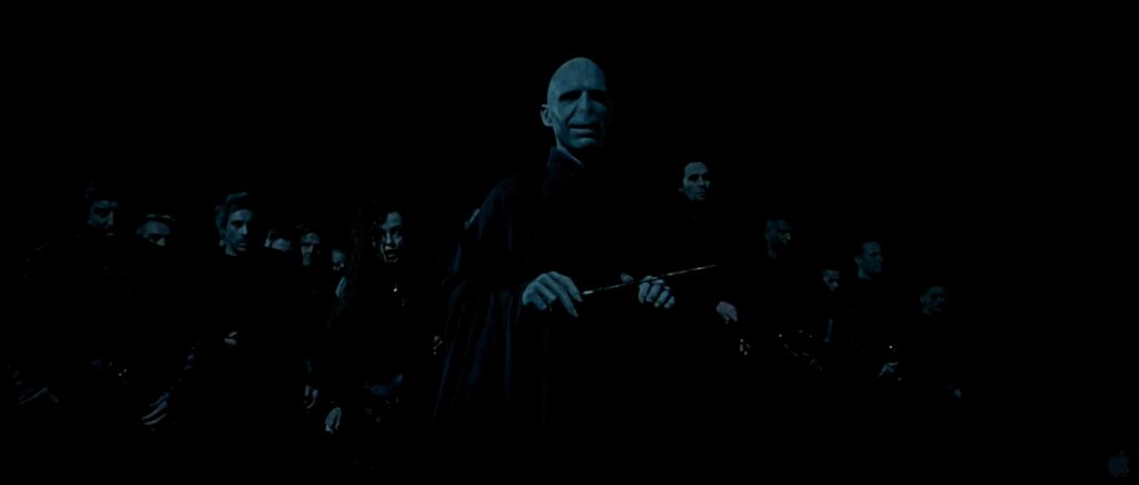 Lord Voldemort leads dark wizards in ominous Harry Potter wallpaper background scene