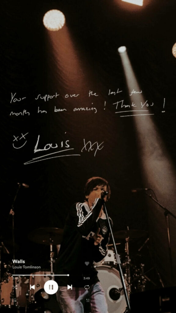 Signature Performance: Louis Tomlinson's Autograph Takes Center Stage Wallpaper