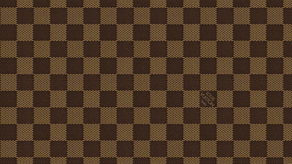 Louis Vuitton inspired brown and gold checkered wallpaper with elegant luxury pattern background