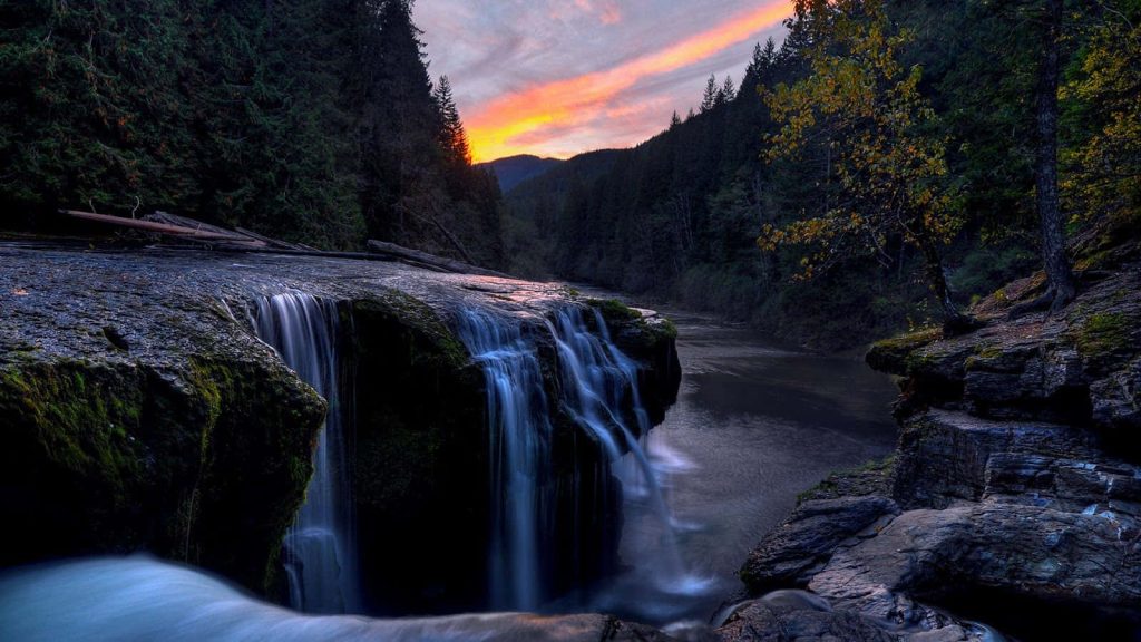 Lower Lewis River Falls at twilight with vibrant sunset and lush forest landscape wallpaper