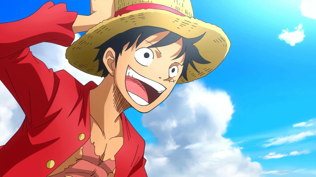 Luffy's Grinning Adventure: The Joyful Monkey D. Luffy Embracing the Clear Blue Sky as a Captivating Wallpaper