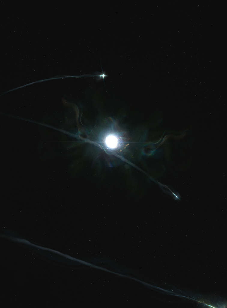 Luminous Celestial Body Wallpaper with Light Rays on Black Background