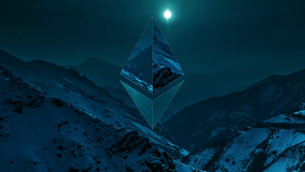 Luminous Ethereum logo glowing over snowy mountain landscape under moonlit night sky wallpaper