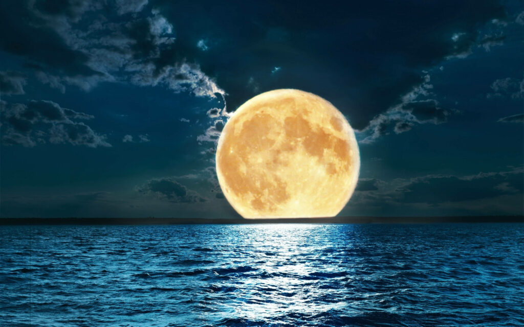 Luminous Full Moon Reflection on Calm Ocean - Serene Wallpaper Background