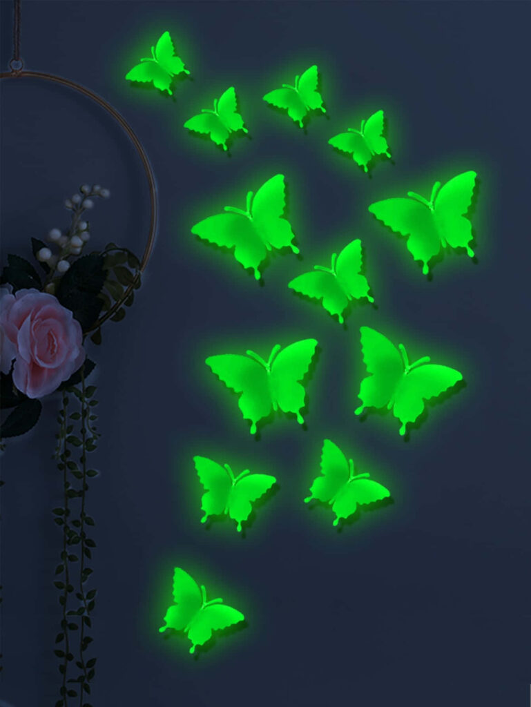 Luminous Green Butterflies Wallpaper: Enchanting Dark Background