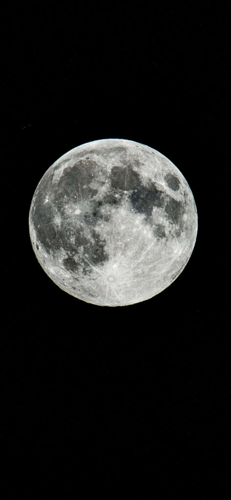 Luminous Moon Wallpaper: Captivating Deep Black Background Design