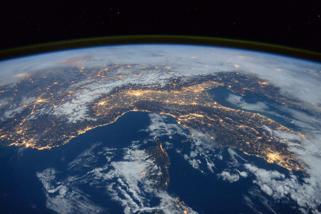 Nighttime Splendor: Mesmerizing 4k Snapshot of Illuminated South America from Astronaut's Spacecraft in Captivating Earth Background Wallpaper