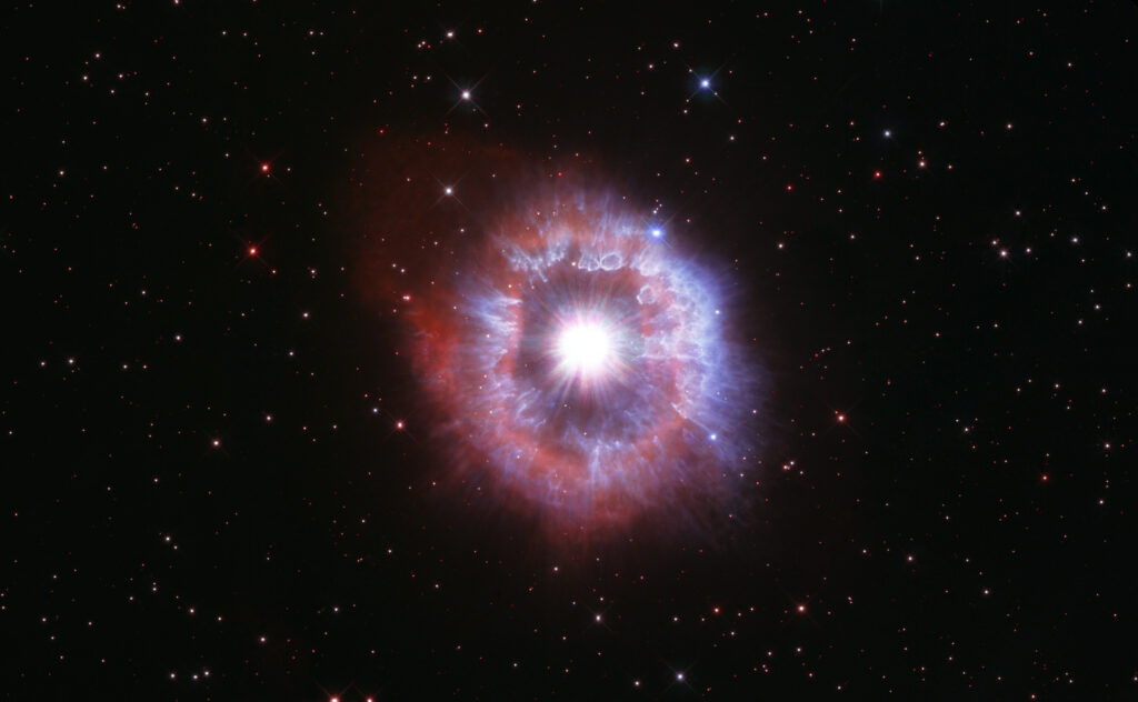 Vibrant Cosmic Star Wallpaper: Radiant Light & Nebula Halo Design