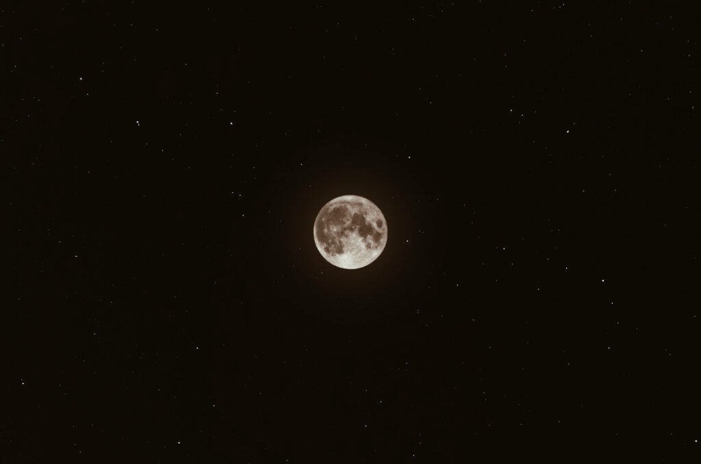 Mystical Night: Dark Galaxy Bathed in the Radiance of a Full Moon Wallpaper