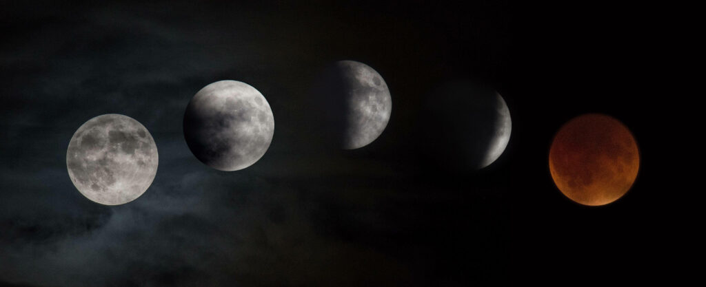 Lunar Eclipse Wallpaper: Mystical Phases Overcast Sky Background
