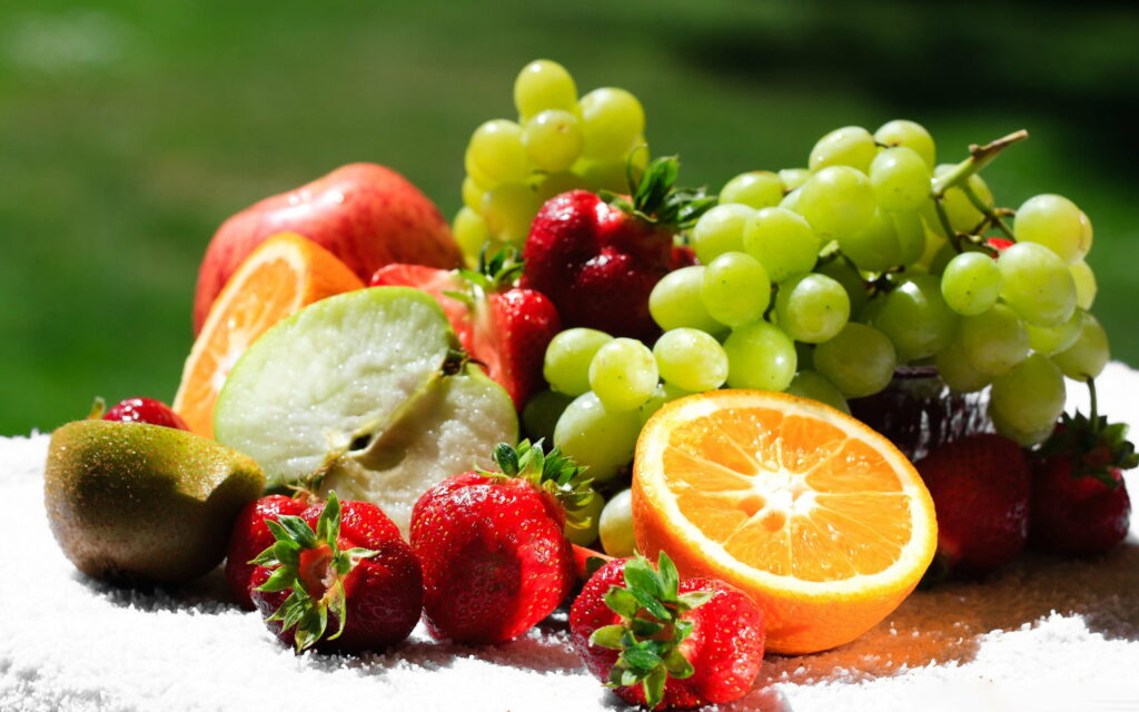 Fruitful Medley: A Bountiful Array of Vibrant Grapes in a Captivating QHD Wallpaper