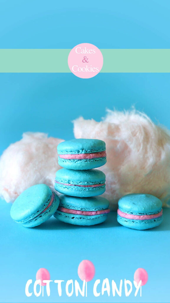 Delectable Treats: Heavenly Blue Macarons with Fluffy Cotton Candy Wallpaper