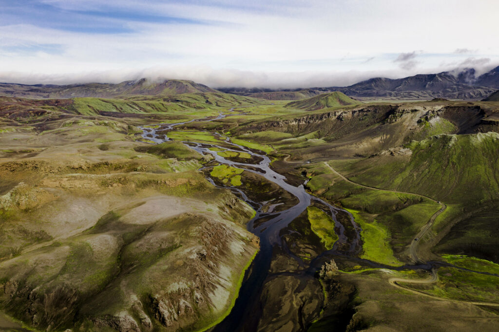 Stunning Aerial Nature Wallpaper: Lush Greens & Winding Rivers