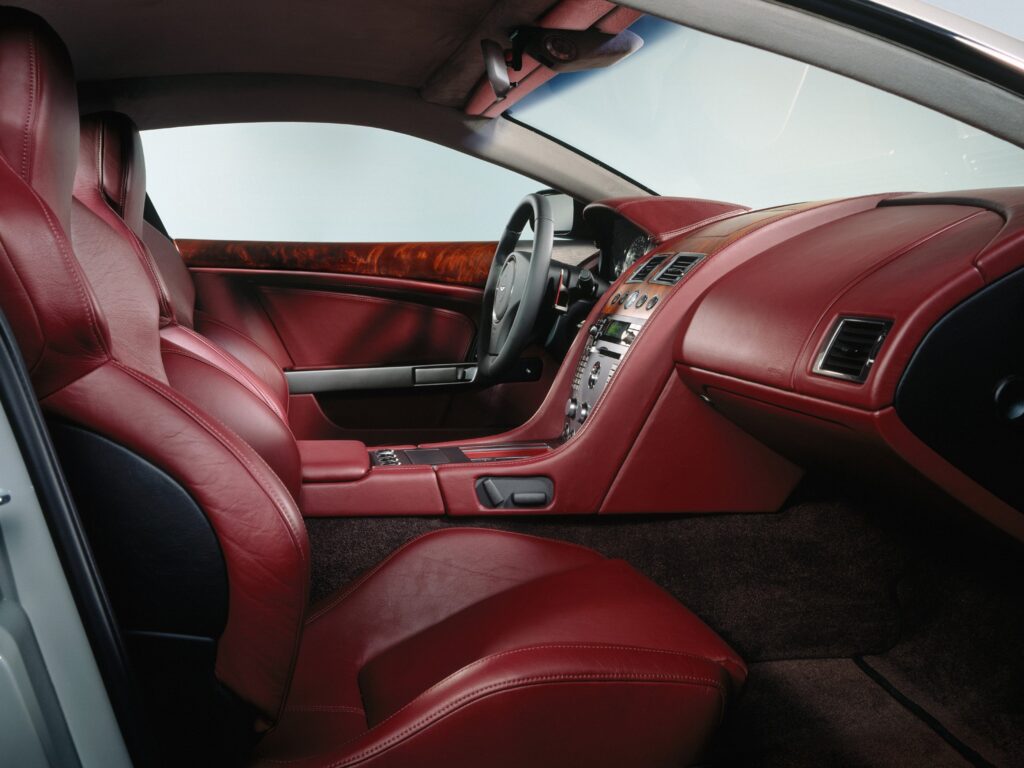 Luxurious 2004 Aston Martin DB9 Interior with Red Leather Seats Wallpaper