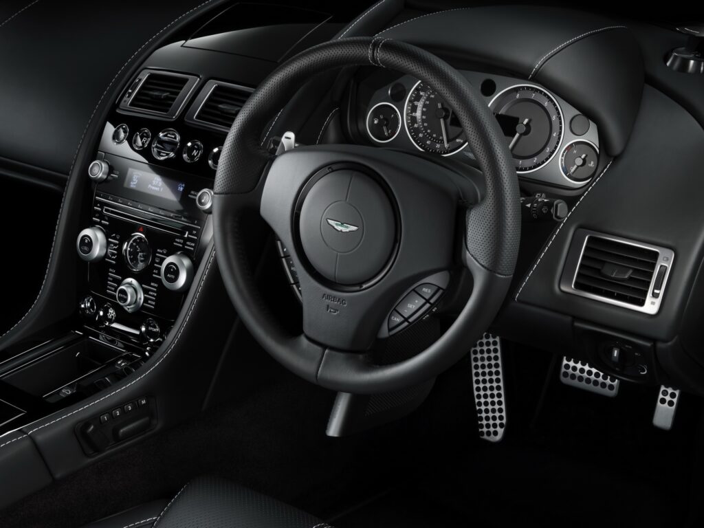Luxurious 2010 Aston Martin DB9 Interior: Leather & Craftsmanship Wallpaper