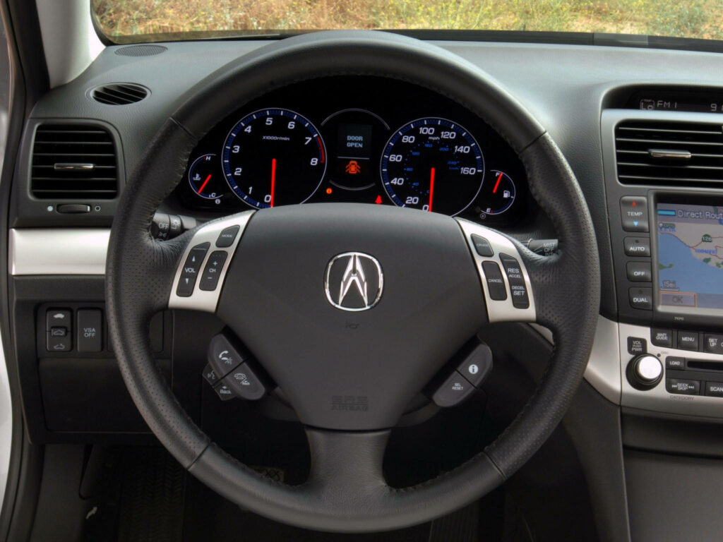 Luxurious Acura Interior Wallpaper: Steering Wheel & Dashboard Design